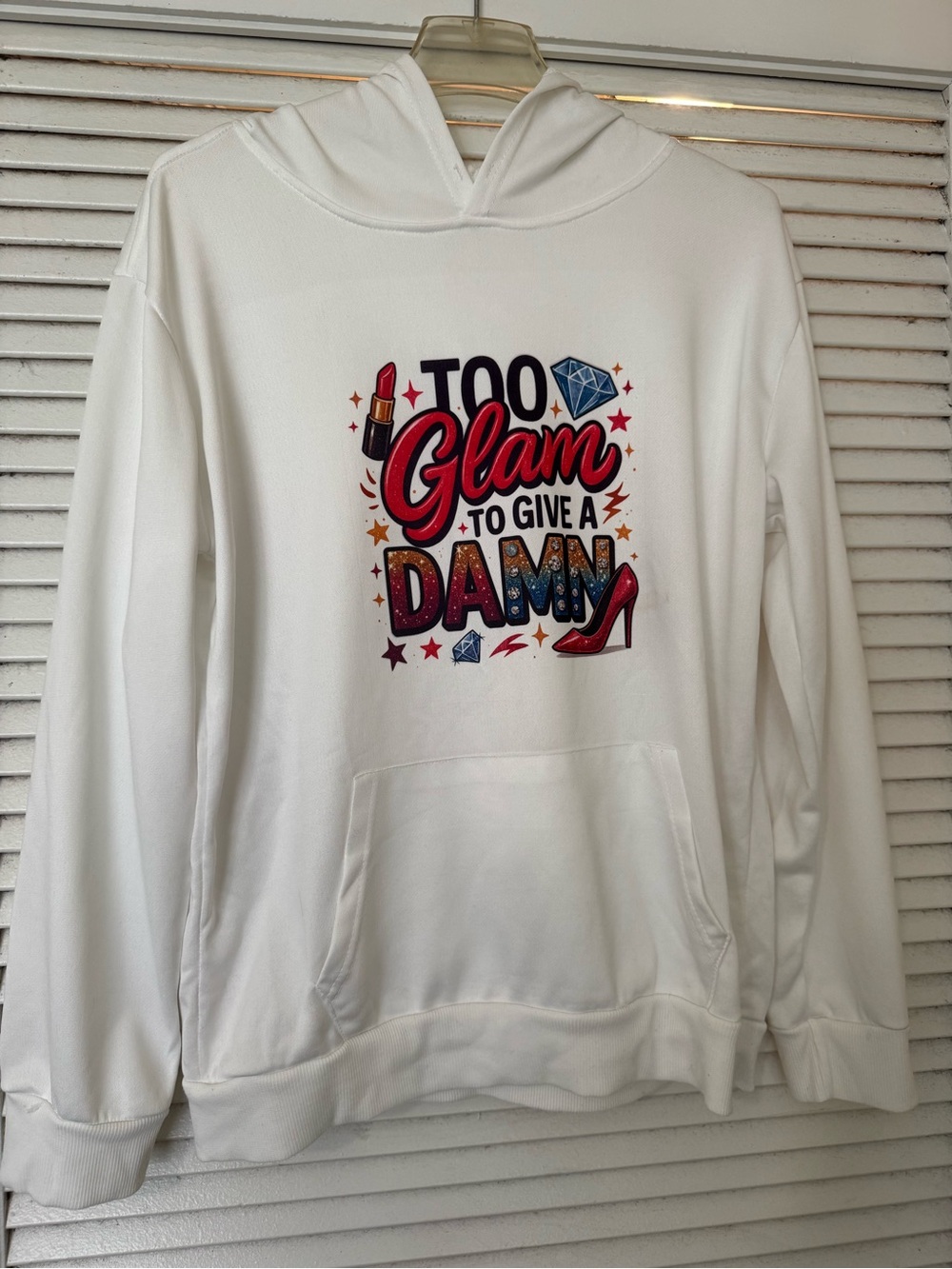 Glam White Hoodie with Red Graphic "Too Glam to Give a Damn"